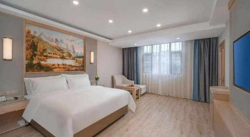 Bed in Vienna Hotel Yuxi Hongta Avenue High-Speed Railway Station