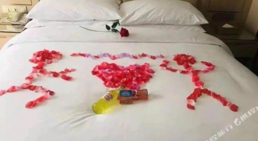 Bed in Vienna Hotel Yuxi Hongta Avenue High-Speed Railway Station