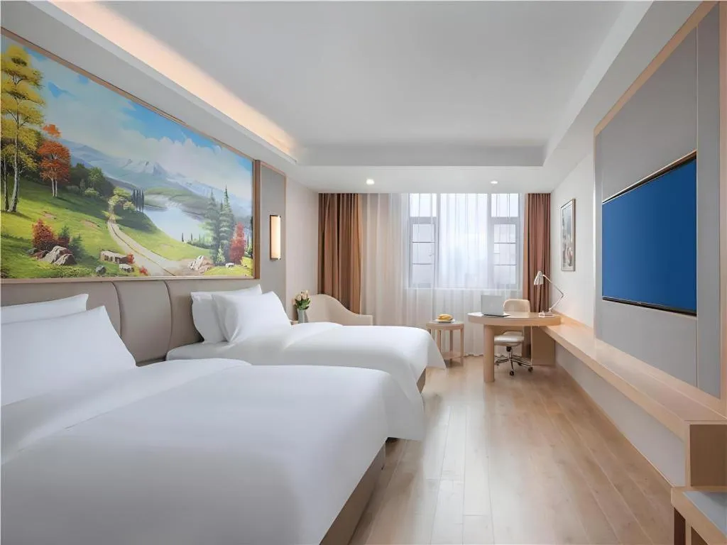 Bed in Vienna Hotel Yuxi Hongta Avenue High-Speed Railway Station