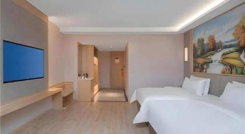 Bed in Vienna Hotel Yuxi Hongta Avenue High-Speed Railway Station