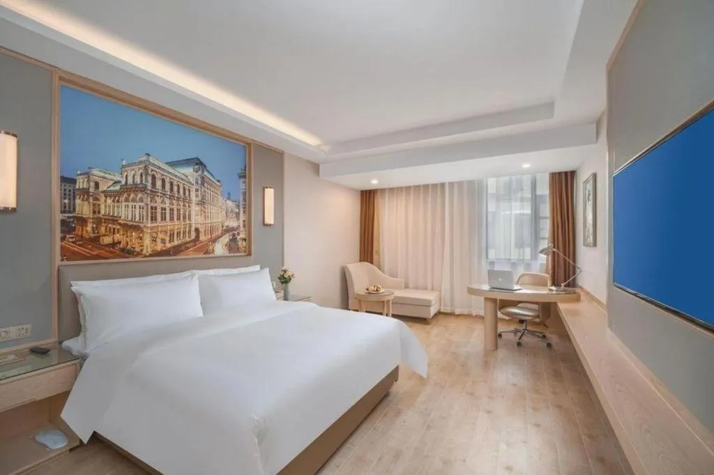 Bed in Vienna Hotel Yuxi Hongta Avenue High-Speed Railway Station