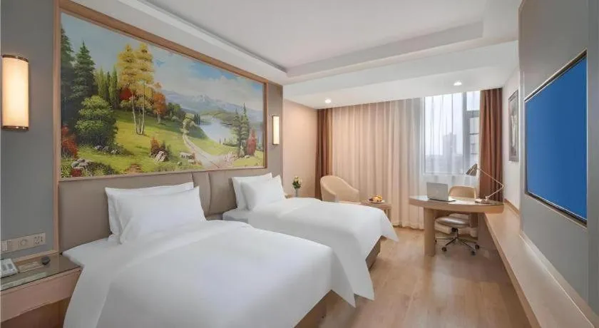 Bed in Vienna Hotel Yuxi Hongta Avenue High-Speed Railway Station