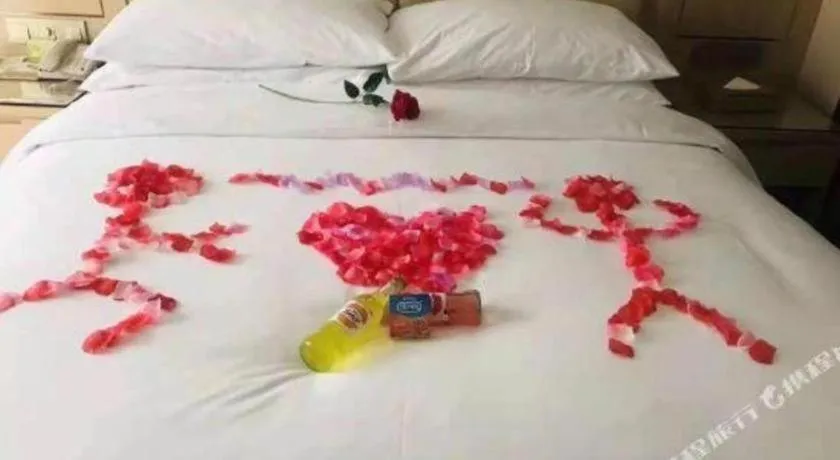 Bed in Vienna Hotel Yuxi Hongta Avenue High-Speed Railway Station