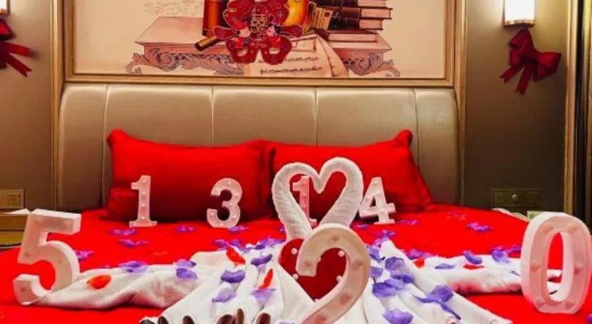 Bed in Vienna Hotel Guangxi Zhongshan Central Plaza West High-Speed Railway Station