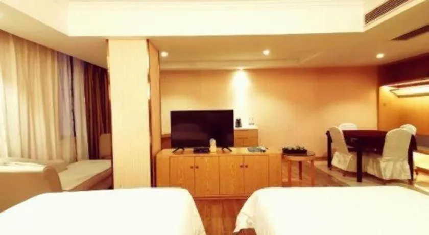 Bed in Vienna Hotel Guangxi Zhongshan Central Plaza West High-Speed Railway Station