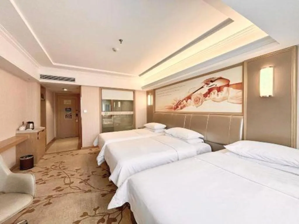 Bed in Vienna Hotel Guangxi Zhongshan Central Plaza West High-Speed Railway Station