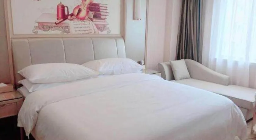 Bed in Vienna Hotel Guangxi Zhongshan Central Plaza West High-Speed Railway Station