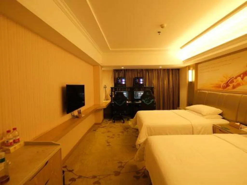 Bed in Vienna Hotel Guangxi Zhongshan Central Plaza West High-Speed Railway Station