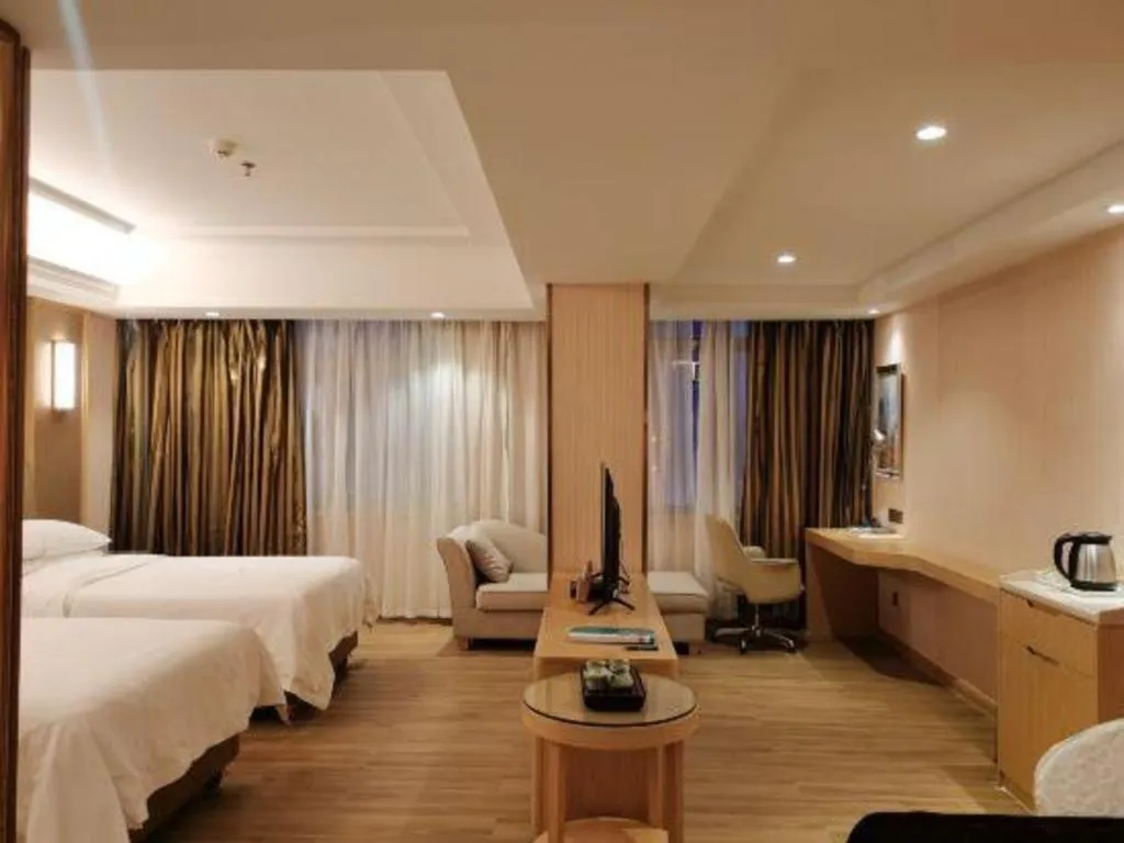 Bed in Vienna Hotel Guangxi Zhongshan Central Plaza West High-Speed Railway Station