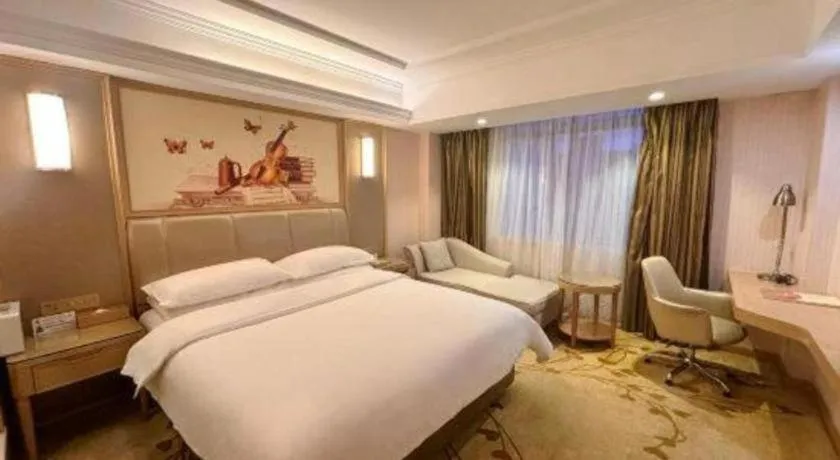 Bed in Vienna Hotel Guangxi Zhongshan Central Plaza West High-Speed Railway Station
