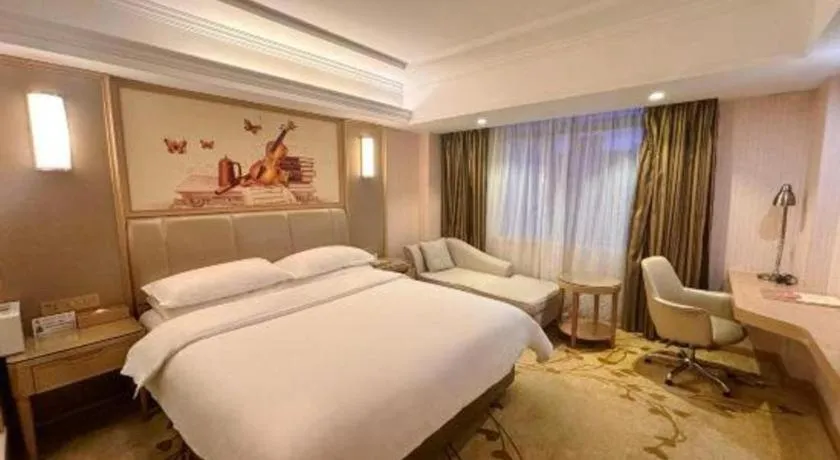 Bed in Vienna Hotel Guangxi Zhongshan Central Plaza West High-Speed Railway Station