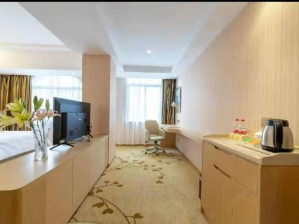 Bed in Vienna Hotel Guangxi Zhongshan Central Plaza West High-Speed Railway Station