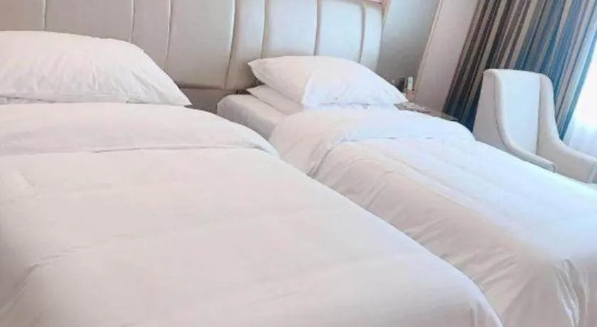 Bed in Vienna Hotel Guangxi Zhongshan Central Plaza West High-Speed Railway Station