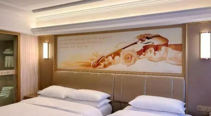 Bed in Vienna Hotel Guangxi Zhongshan Central Plaza West High-Speed Railway Station