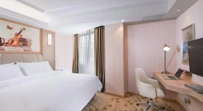 Bed in Vienna Hotel Guangxi Zhongshan Central Plaza West High-Speed Railway Station