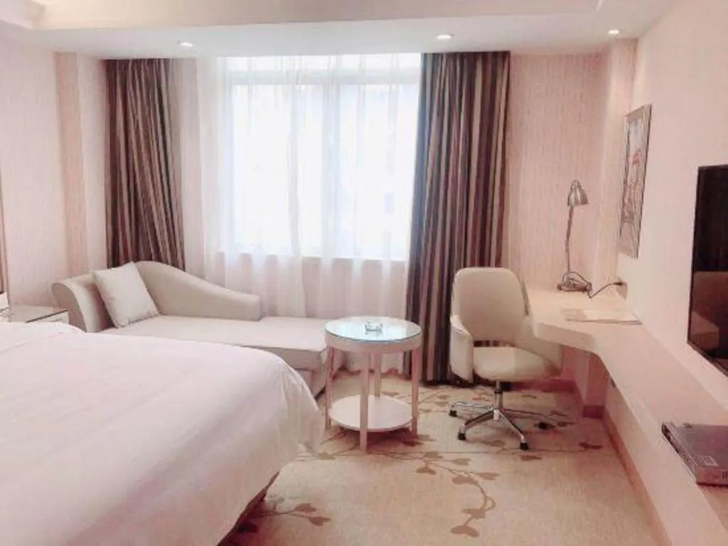 Bed in Vienna Hotel Guangxi Zhongshan Central Plaza West High-Speed Railway Station