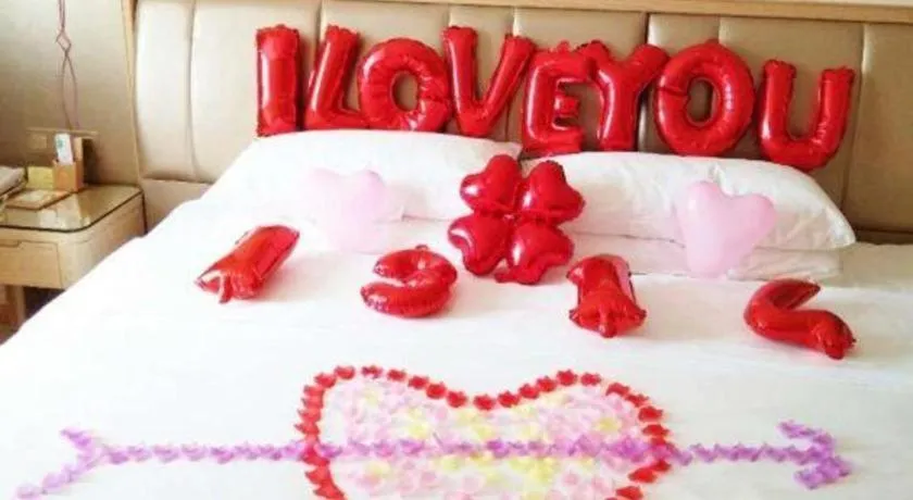 Bed in Vienna Hotel Guangxi Zhongshan Central Plaza West High-Speed Railway Station