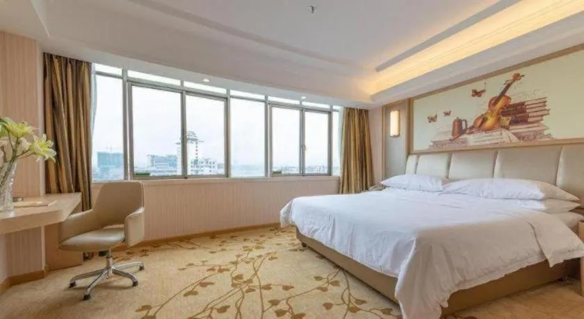 Bed in Vienna Hotel Guangxi Zhongshan Central Plaza West High-Speed Railway Station