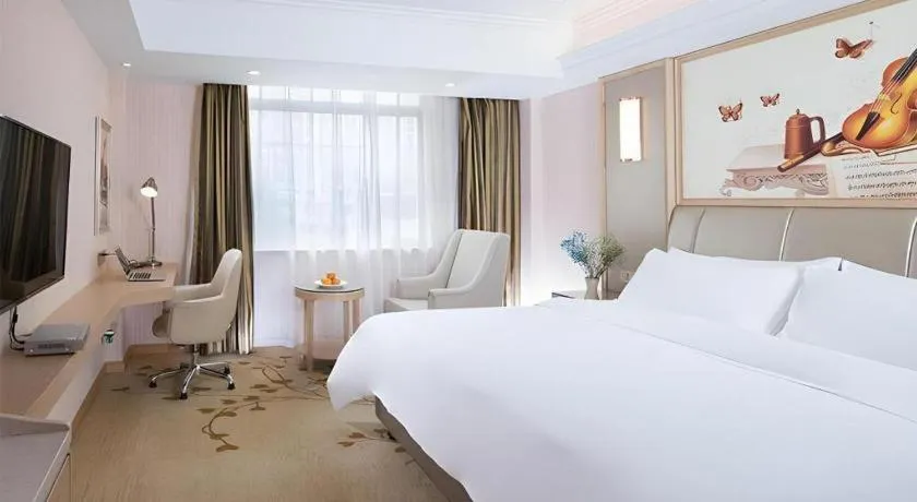 Bed in Vienna Hotel Guangxi Zhongshan Central Plaza West High-Speed Railway Station