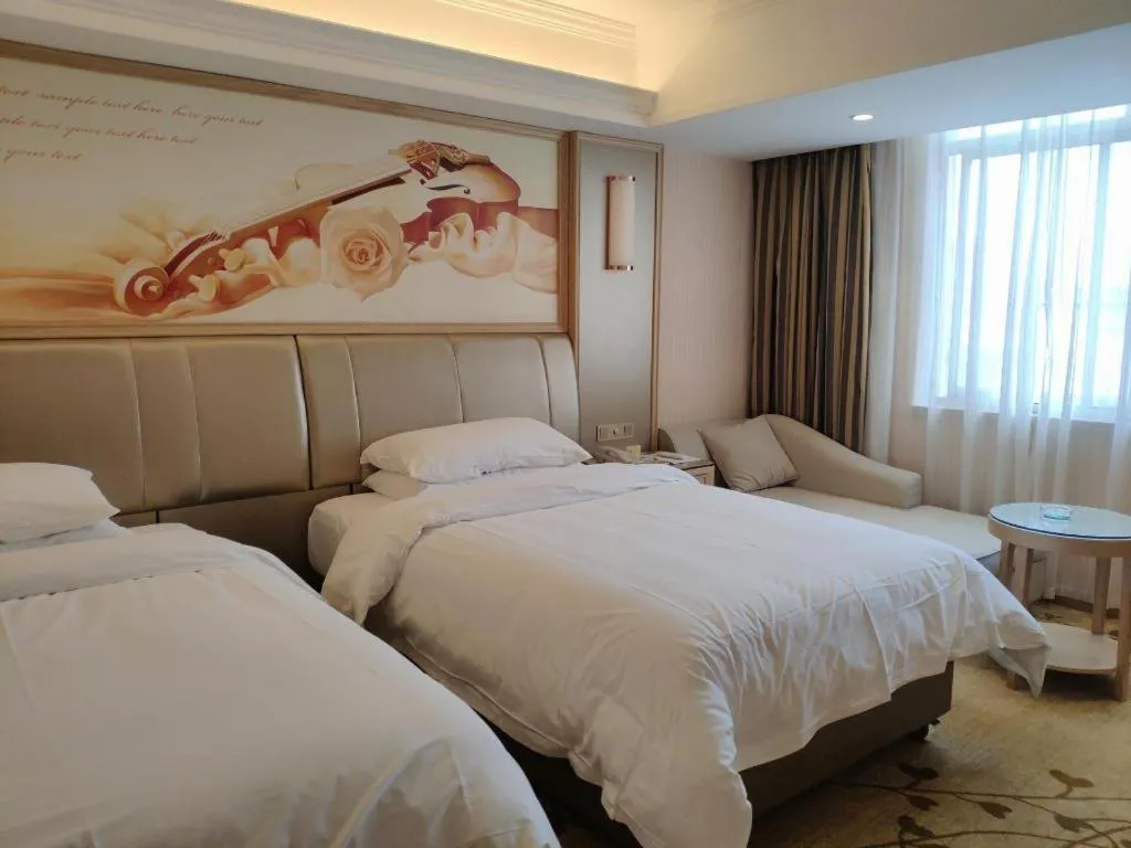 Bed in Vienna Hotel Guangxi Zhongshan Central Plaza West High-Speed Railway Station