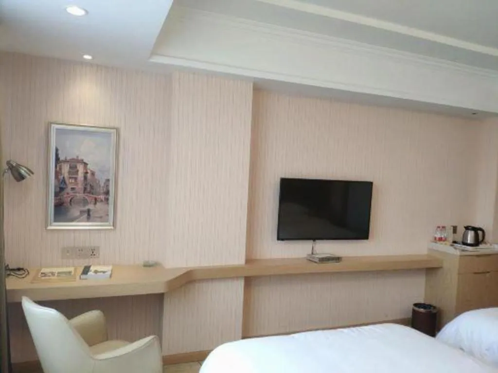 Bed in Vienna Hotel Guangxi Zhongshan Central Plaza West High-Speed Railway Station