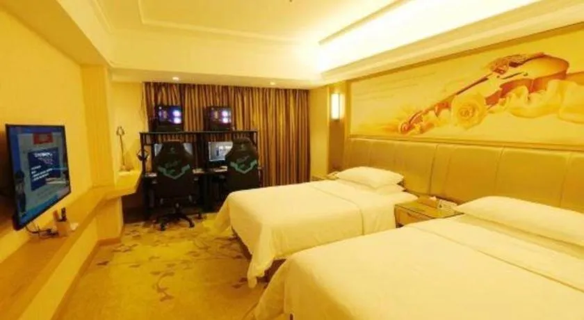 Bed in Vienna Hotel Guangxi Zhongshan Central Plaza West High-Speed Railway Station