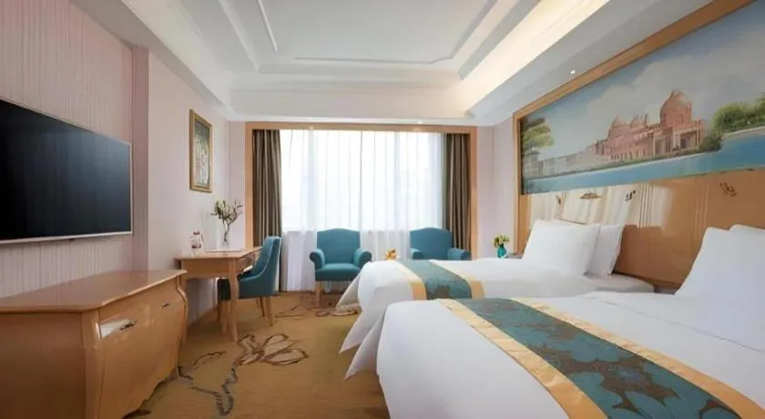 Bed in Vienna Hotel Hubei Jinzhou Jianli Jiangcheng