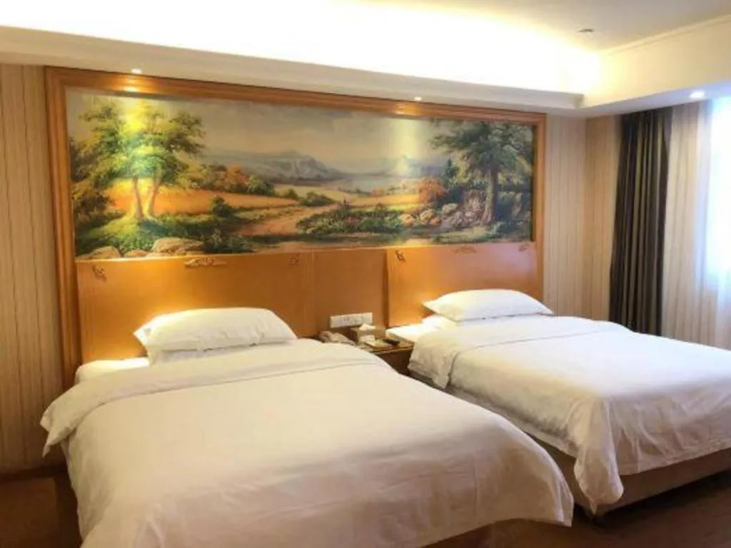 Bed in Vienna Hotel Hubei Jinzhou Jianli Jiangcheng