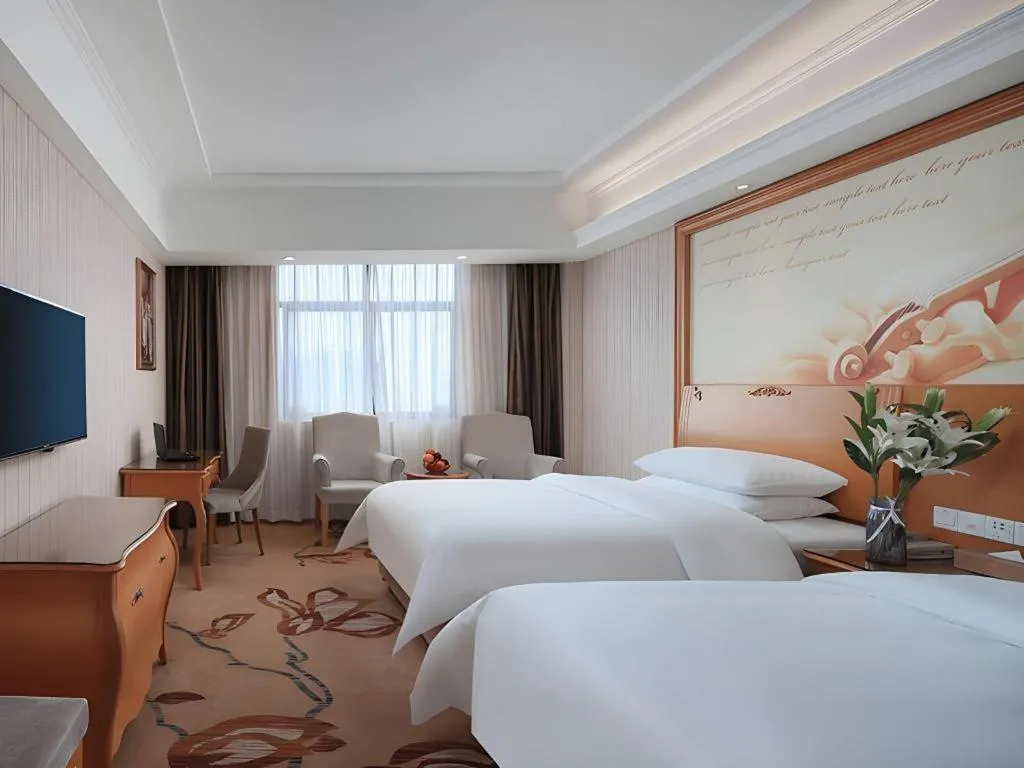 Bed in Vienna Hotel Hubei Jinzhou Jianli Jiangcheng
