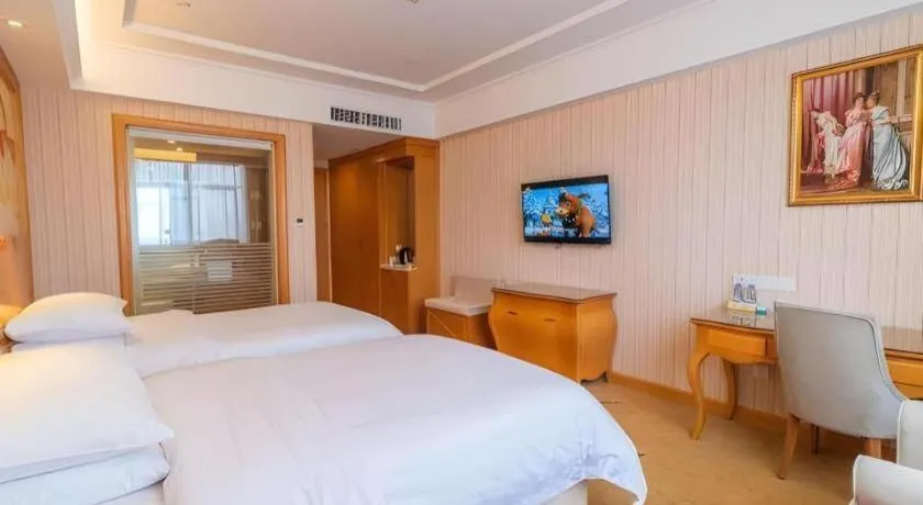Bed in Vienna Hotel Hubei Jinzhou Jianli Jiangcheng