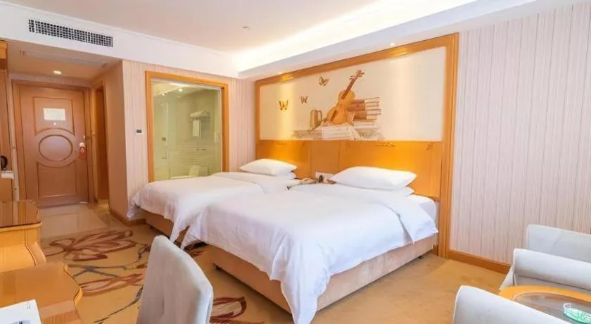 Bed in Vienna Hotel Hubei Jinzhou Jianli Jiangcheng