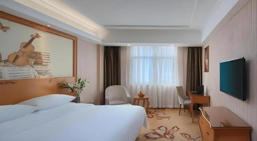Bed in Vienna Hotel Hubei Jinzhou Jianli Jiangcheng