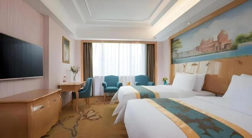 Bed in Vienna Hotel Hubei Jinzhou Jianli Jiangcheng