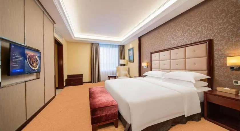 Bed in Venus Royal Hotel Shenzhen International Exhibition Center