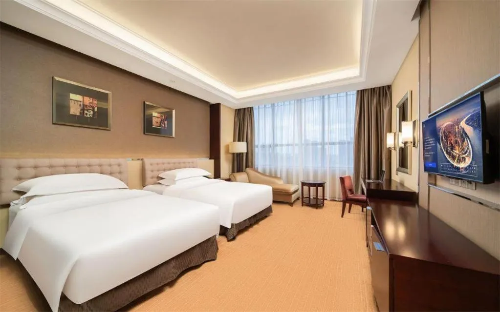 Bed in Venus Royal Hotel Shenzhen International Exhibition Center