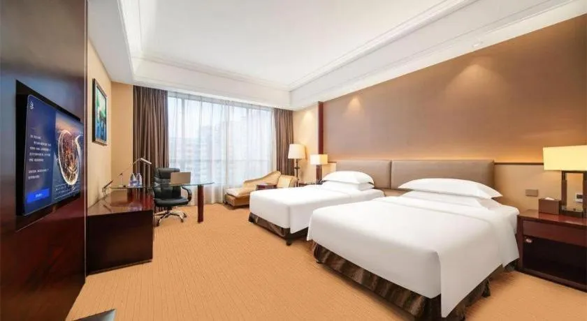 Bed in Venus Royal Hotel Shenzhen International Exhibition Center