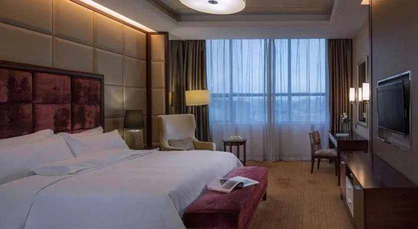 Bed in Venus Royal Hotel Shenzhen International Exhibition Center