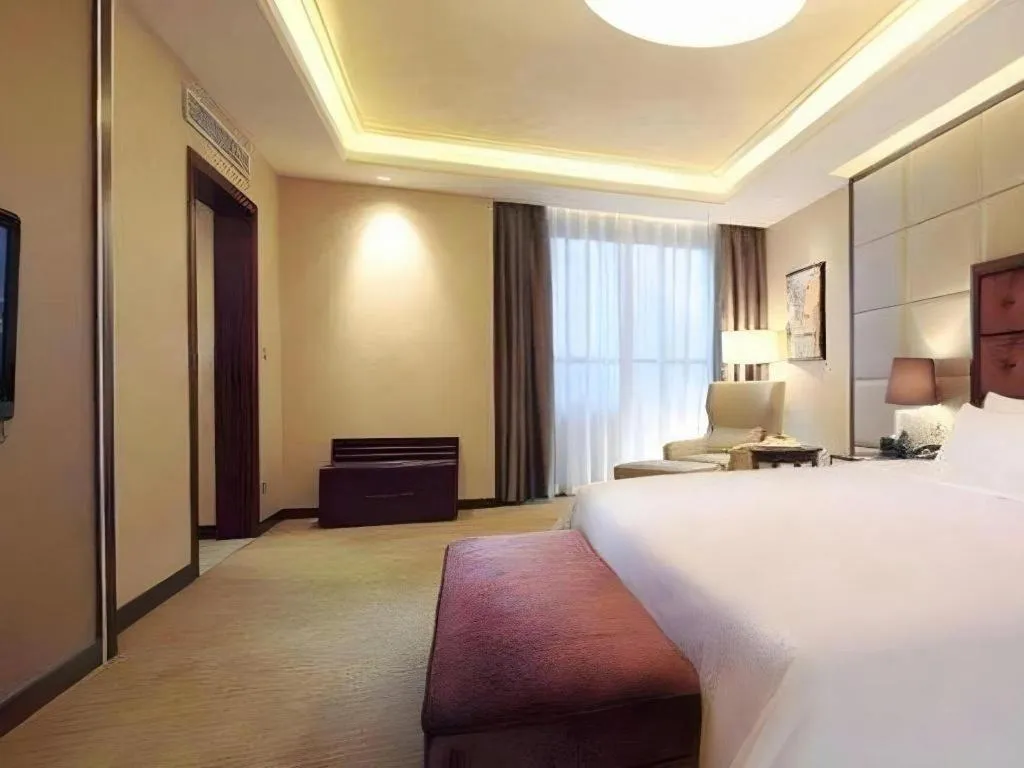 Bed in Venus Royal Hotel Shenzhen International Exhibition Center