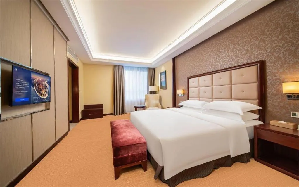 Bed in Venus Royal Hotel Shenzhen International Exhibition Center