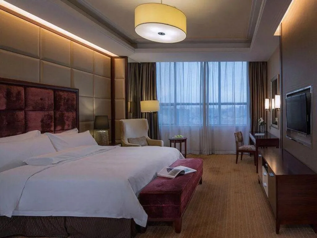 Bed in Venus Royal Hotel Shenzhen International Exhibition Center