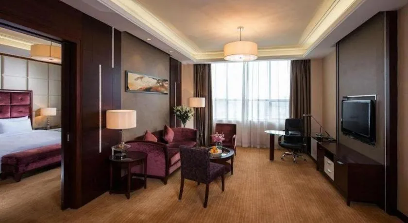 Bed in Venus Royal Hotel Shenzhen International Exhibition Center