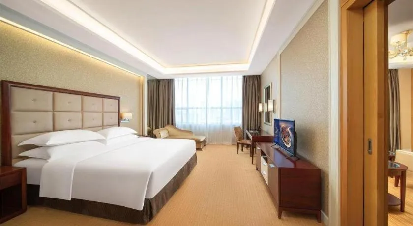 Bed in Venus Royal Hotel Shenzhen International Exhibition Center