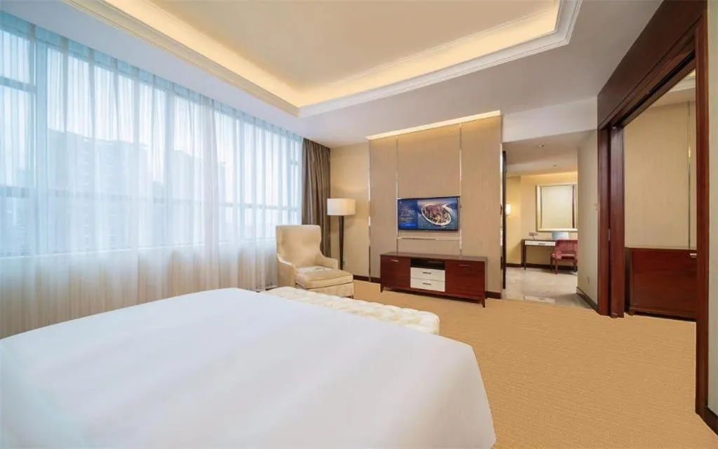 Bed in Venus Royal Hotel Shenzhen International Exhibition Center