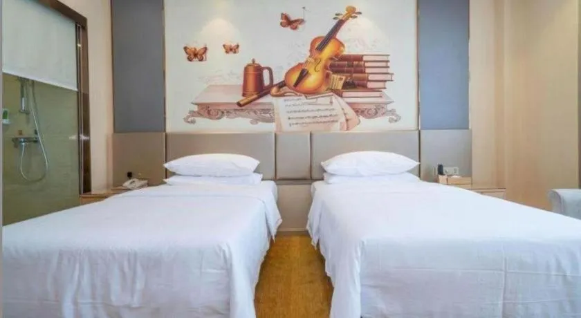 Bed in Vienna Hotel Fuzhou Changle Zhenghe Metro Station