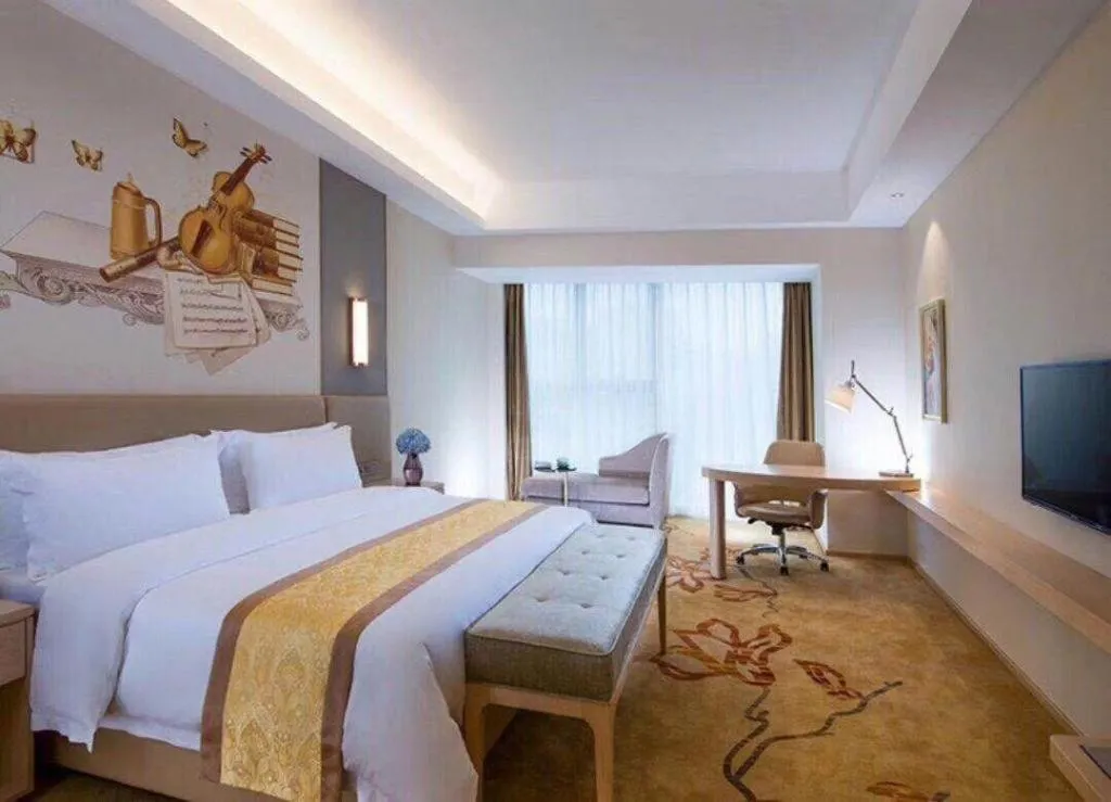 Bed in Vienna Hotel Fuzhou Changle Zhenghe Metro Station