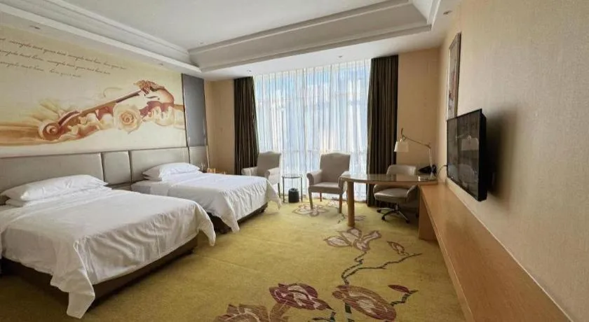 Bed in Vienna Hotel Fuzhou Changle Zhenghe Metro Station