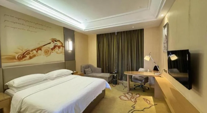 Bed in Vienna Hotel Fuzhou Changle Zhenghe Metro Station