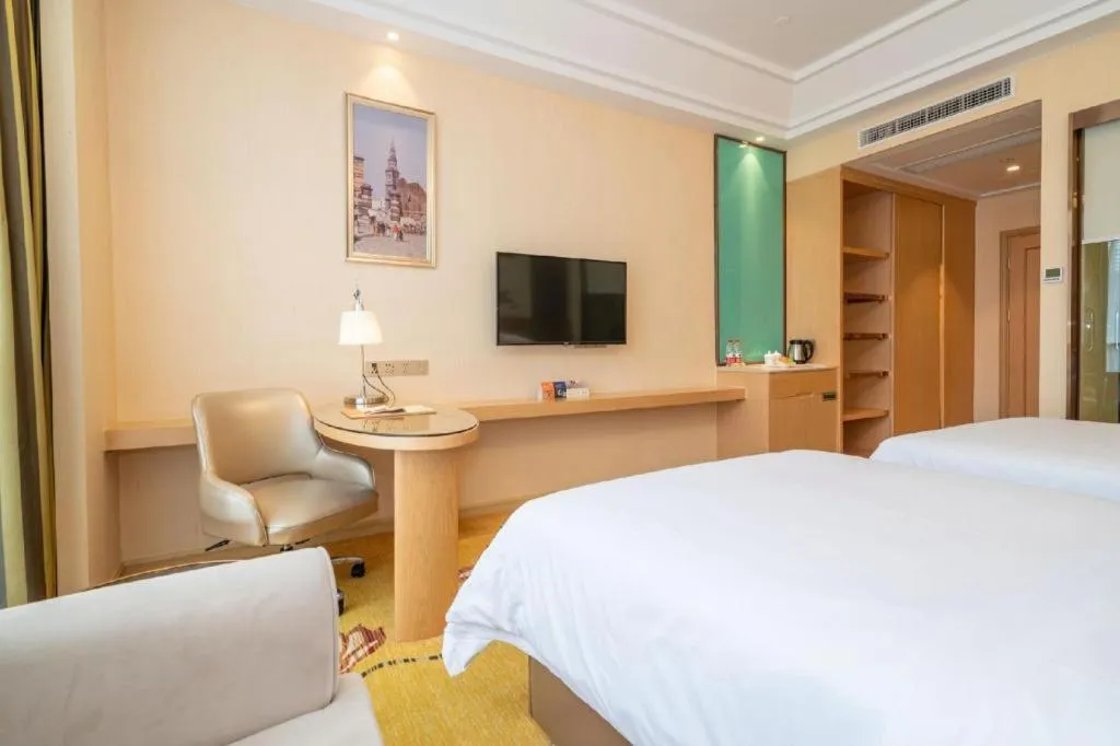 Bed in Vienna Hotel Fuzhou Changle Zhenghe Metro Station