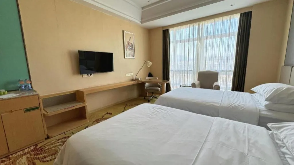 Bed in Vienna Hotel Fuzhou Changle Zhenghe Metro Station