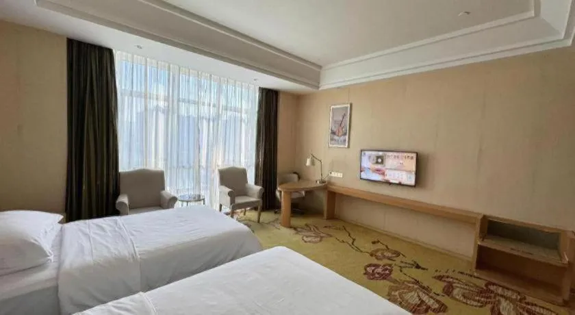 Bed in Vienna Hotel Fuzhou Changle Zhenghe Metro Station